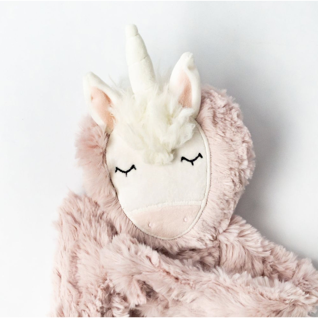 Rose Unicorn Snuggler - Authenticity